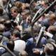 NYSE traders excitedly swarm the piece of actual, tangible currency.
